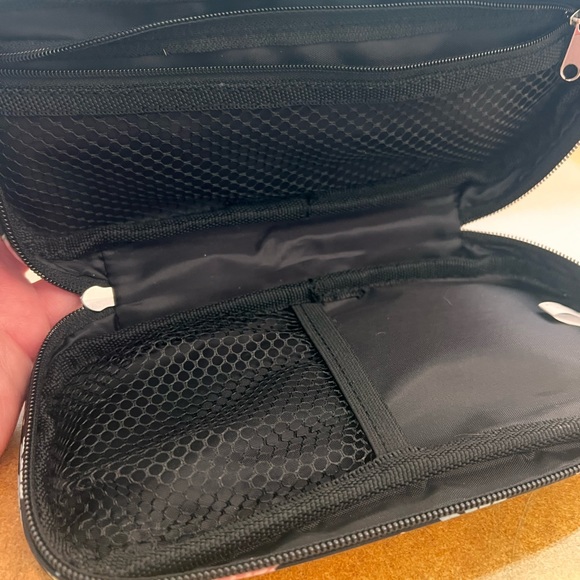 20% off listed price Makeup case. Zipper closure. Black with floral design - Picture 2 of 2